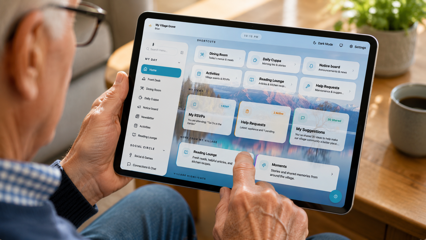 Close-up of an older resident's hand confidently tapping a large tile on the PiP home screen.